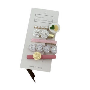 Five-piece French pearl and heart hair clip set in cream colors with floral accents