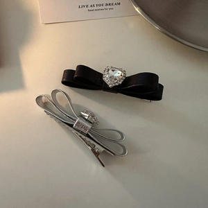 Elegant black satin and silver bow hair clips with heart-shaped zircon stones and rhinestones