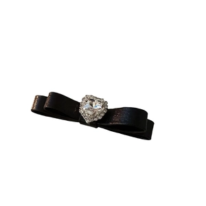 Elegant black satin bow hair clip with a large sparkling heart-shaped zircon center