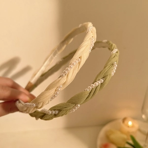 Elegant woven pearl headband for women in cream and sage green colors with soft chiffon texture