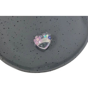 Y2K style heart resin hair clip with pink flowers and colorful star sequins