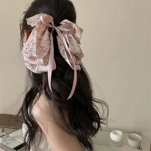 Pink floral bow hair claw clip with elegant ribbon streamers for women hair styling