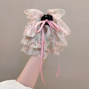 Pince à cheveux en mousseline fleurie avec nœud en satin rose élégant