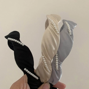 Handmade satin twisted headbands with pearl accents in black, cream, and blue gray