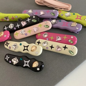 Lot de barrettes à strass colorées aux tons acidulés avec des bases en métal ondulées