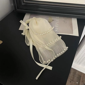 Pince à cheveux élégante en organza blanc cassé avec nœud perlé et rubans plissés chics