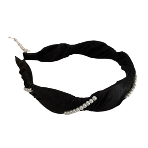 Elegant black fabric knotted headband featuring white pearl accents for a stylish look