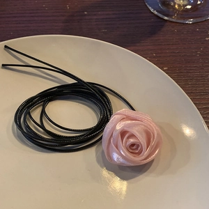 Pink silk rose choker necklace with thin black cord and handmade ribbon petals