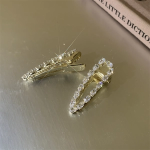 French vintage gold hair clips set with clear zircon stones for elegant side styling