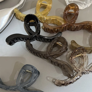 Grandes pinces à cheveux françaises aux couleurs gelée avec design torsadé croisé
