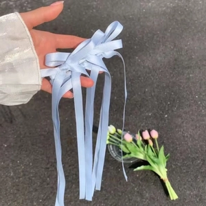 Light blue satin bow hair clip with long ribbons for double ponytail hairstyles