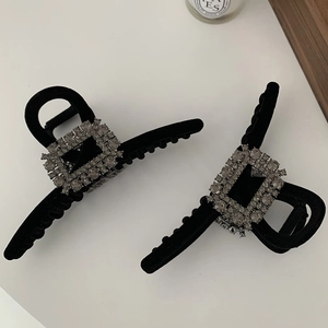 Elegant set of two black velvet hair claw clips with sparkling square rhinestone accents