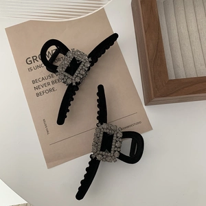 Elegant black velvet hair claw clip with square crystal accents for women