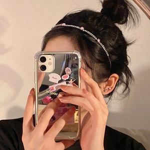 Stylish transparent iPhone case with Barbie stickers and metallic chain headband accessory