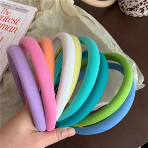 Collection détaillée de serre-têtes en éponge aux couleurs pastel et acidulées
