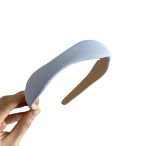 Padded light blue wavy headband with honeycomb woven texture to boost hair volume and crown height