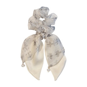 Elegant off-white organza hair scrunchie with silver floral glitter and pearl charms
