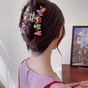 Pince à cheveux transparente avec figurines colorées pour femmes en chignon