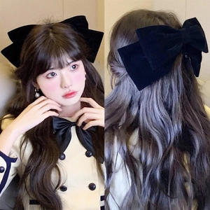 Elegant oversized black velvet bow hair clip for women in vintage French style