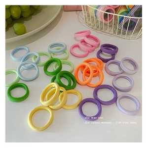 Close-up of colorful seamless elastic hair ties in macaron colors for women's ponytails