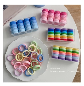 Detail of high-elasticity colorful hair ties set in assorted macaron and rainbow shades
