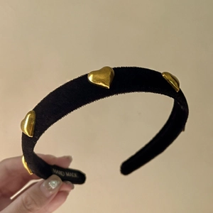 Vintage black velvet headband with gold heart accents and handmade label for women