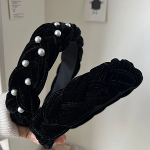 Braided black velvet headband set with elegant faux pearl accents for a stylish hair accessory