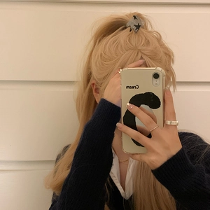 Y2K style star pattern hair claw clip on blonde hair for high ponytail styling