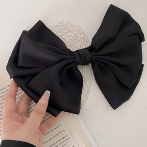 Barrette à cheveux élégante avec un grand nœud en satin noir de style français