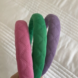 Padded plaid fabric headbands in pink green and purple with quilted diamond patterns