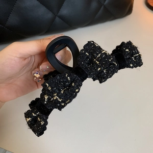 French style black tweed bow hair claw clip with gold tinsel accents for women