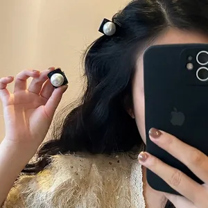 French retro pearl hair claw clip with black square base for elegant hair styling
