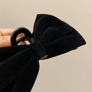 Elegant black velvet bow hair claw clip for women in a classic French princess style
