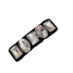 French vintage luxury hair clip with large rhinestones and pearls on black fabric base