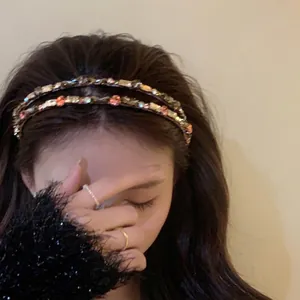 Elegant double-layered headband with multi-colored rhinestones for a high cranial top look
