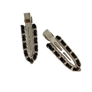 Set of two silver metal hair clips with black woven chain design for women