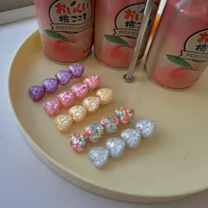 Sweet resin heart hair clips with sequins and glitter in various pastel colors