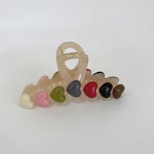 Elegant beige translucent hair claw clip with colorful resin heart charms for women