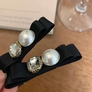 Exquisite black satin ribbon hair clips set with white pearls and sparkling rhinestones