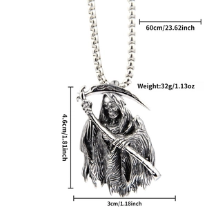 Close-up of a silver Grim Reaper pendant showing detailed sickle design and metal texture