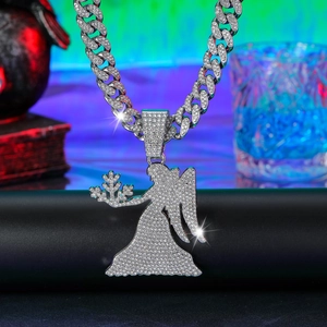 Close-up of hip-hop angel pendant with cubic zirconia on a thick Cuban chain link