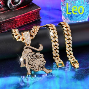 Macro shot of gold hip hop Cuban chain with Leo lion pendant featuring sparkling rhinestones