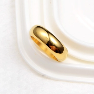 Minimalist high-polished golden dome ring featuring a sleek mirror finish for women