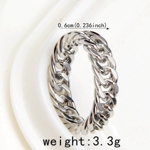 Detailed close-up showing 0.6cm width and 3.3g weight of the silver Cuban chain ring