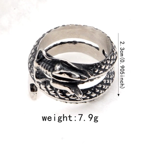 Detail view of hip hop dragon ring with scale texture and size dimensions shown