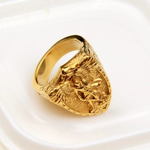 Golden hip hop ring featuring detailed relief of Archangel Michael in classical style