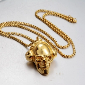 Hip-Hop Totenkopf Anhänger mit Kopfhörern in Gold-Optik mit robuster Box-Halskette