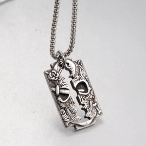 Retro stainless steel razor blade pendant with skull and rose on a bead chain necklace