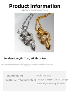 Detail of dragon pendant with white pearl and sparkling crystals in gold and silver