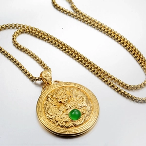 Chinese dragon relief totem pendant necklace with green gemstone and gold plating